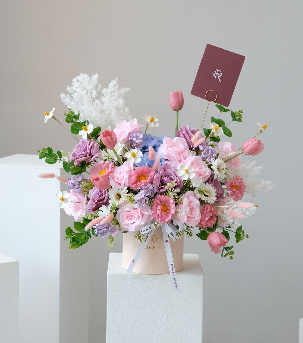 Violetta Grace - Blue hydrangea with tulip, roses & dried accents — rich, varied, and lasting. - Rena The Blossom Jakarta